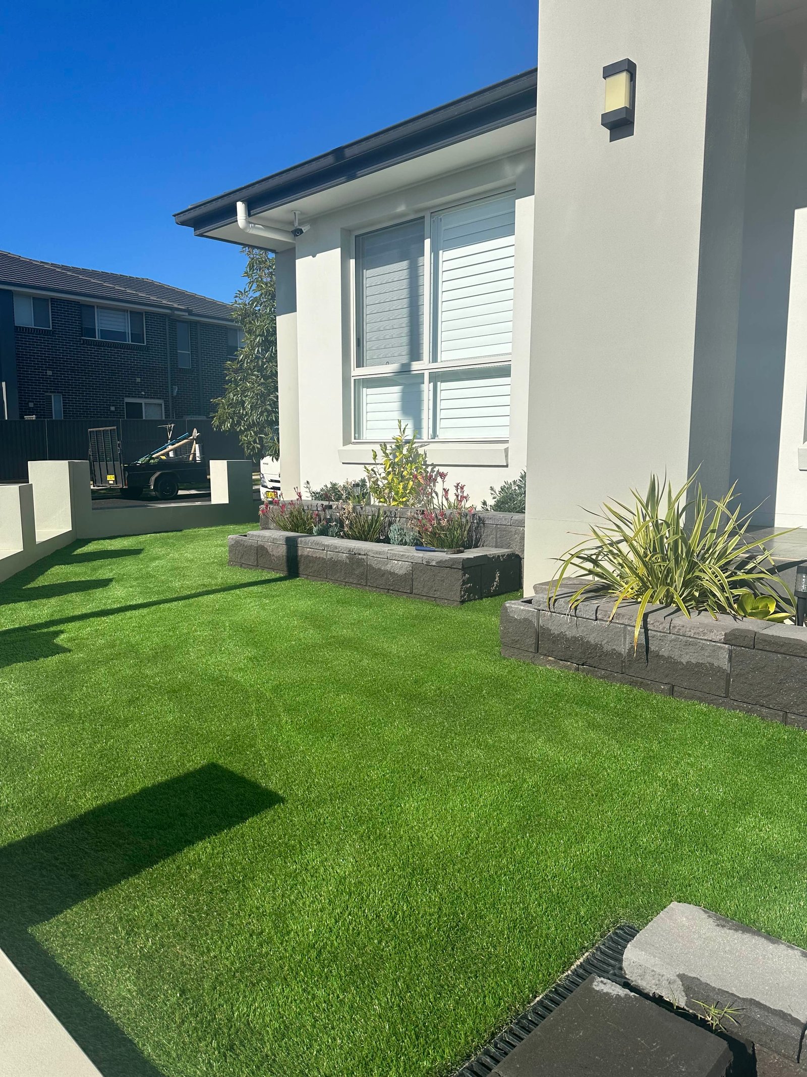 Lush green synthetic lawn — Greenscape Turfing installation